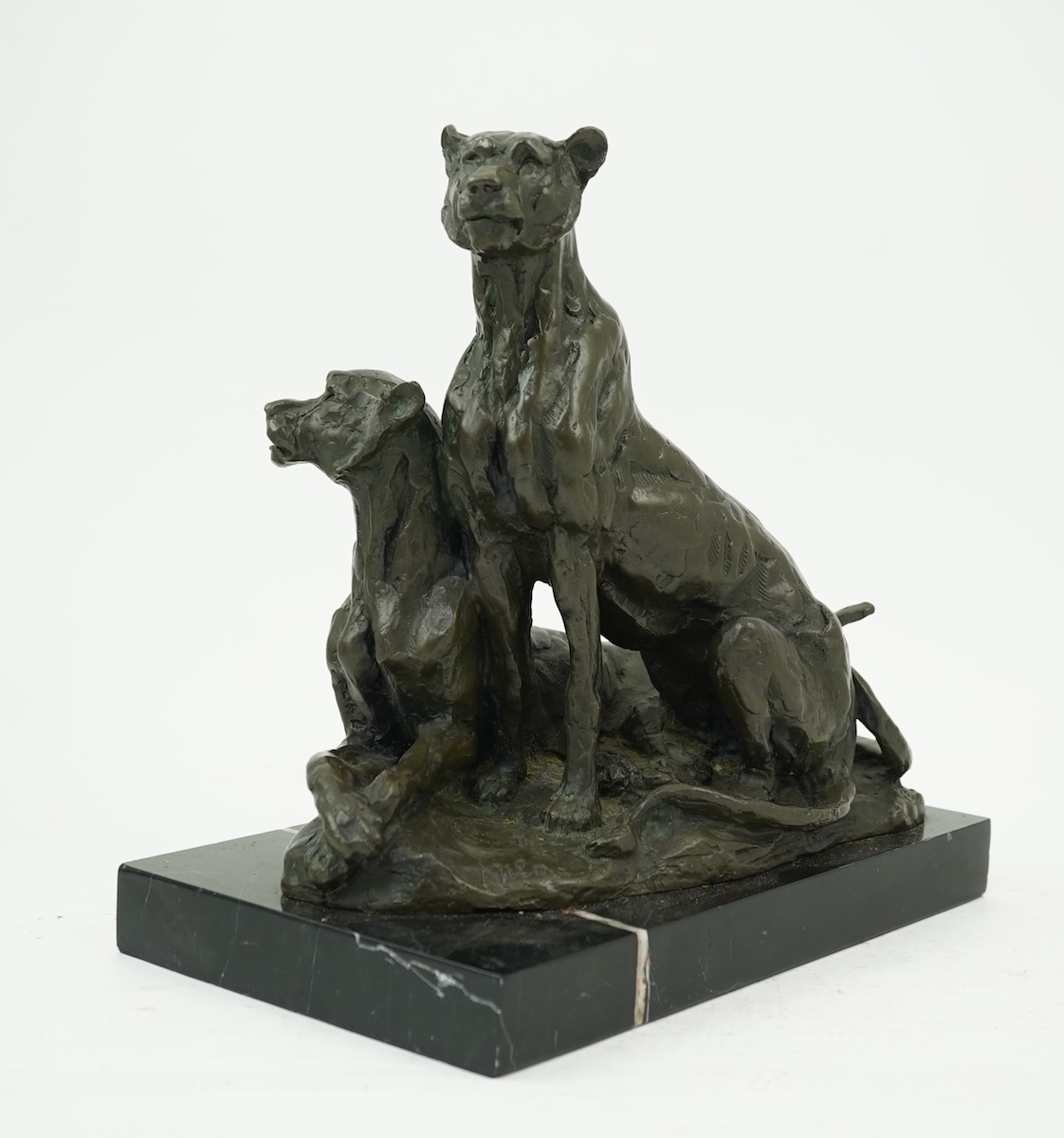 Miguel Fernando Lopez (Portuguese, contemporary): A painted bronze group of two lionesses